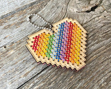 Load image into Gallery viewer, Rainbow heart DIY laser cut wood cross stitch kit by Canadian Stitchery
